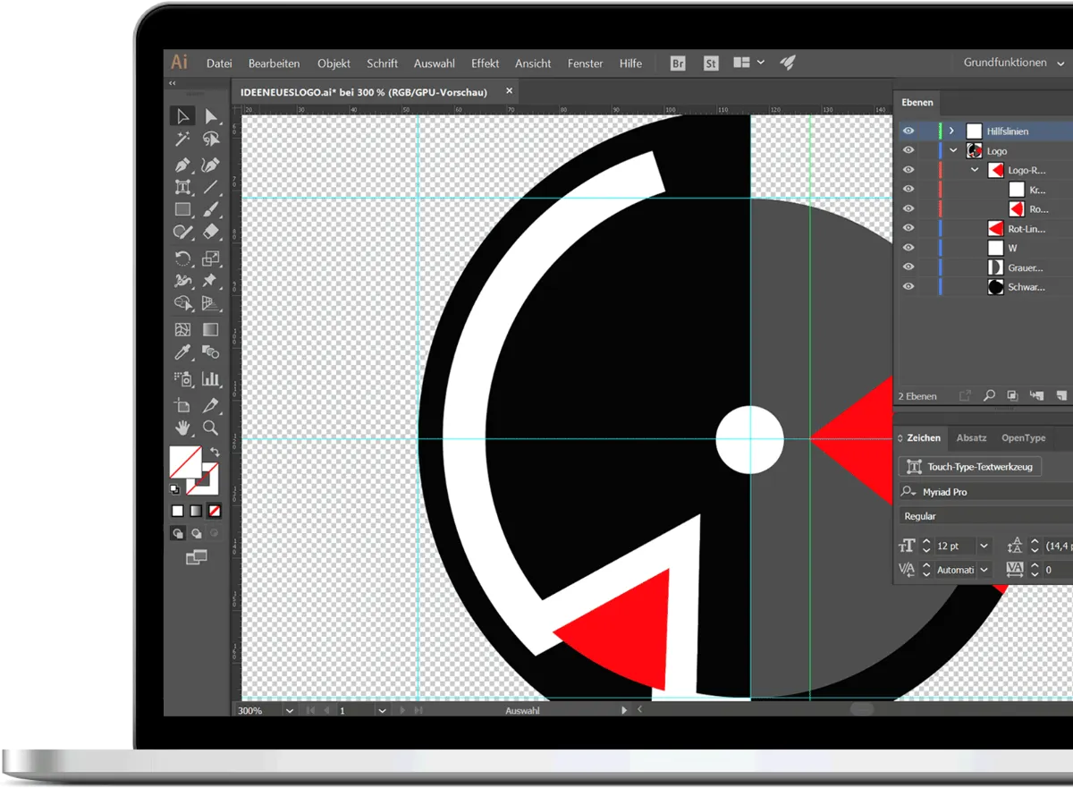 Logo-Gestaltung in Adobe Illustrator auf einem Laptop
